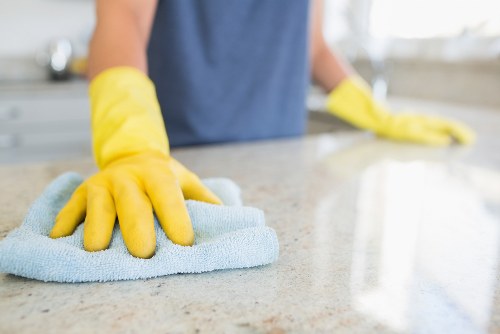 Technician demonstrating staff training and professional cleaning standards